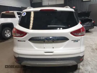 2016 Ford Escape Titanium with VIN 1FMCU9J94GUB02810, listed as a IAAI auction lot 41643907 with 119,684 mi miles. Bid and sale history available at carsss.com. Image 15.