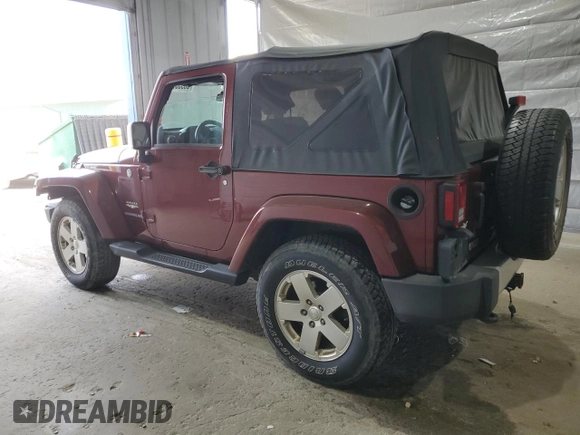 2010 Jeep Wrangler Sahara z VIN 1J4GA5D11AL106768, wystawiony jako Copart lot #56935745 z przebiegiem 143 212 mil mil oraz Szkoda całkowita • Salvage title. Historia ofert i sprzedaży dostępna na DreamBid. Obrazek 2.