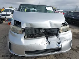 2009 Scion xB with VIN JTLKE50E691089958, listed as a IAAI auction lot 41700775 with 129,396 mi miles. Bid and sale history available at carsss.com. Image 12.