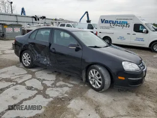 2010 Volkswagen Jetta Limited Edition with VIN 3VWRX7AJ7AM124457, listed as a Copart auction lot 52967135 with 206,069 mi miles and Salvage title. Bid and sale history available at DreamBid. Image 4.