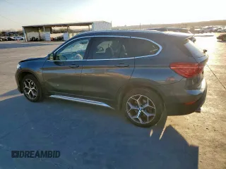2019 BMW X1 xDrive28i with VIN WBXHT3C51K3H34687, listed as a Copart auction lot 50135845 with 59,549 mi miles and Salvage Title. Bid and sale history available at carsss.com. Image 2.