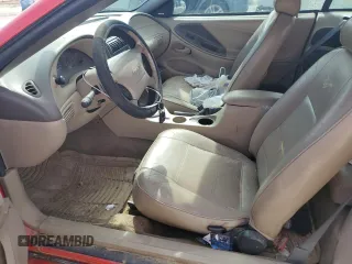 2003 Ford Mustang Deluxe z VIN 1FAFP44403F407589, wystawiony jako Copart lot #54002265 z przebiegiem 176 019 mil mil oraz Nie do naprawy • Non repairable. Historia ofert i sprzedaży dostępna na DreamBid. Obrazek 7.