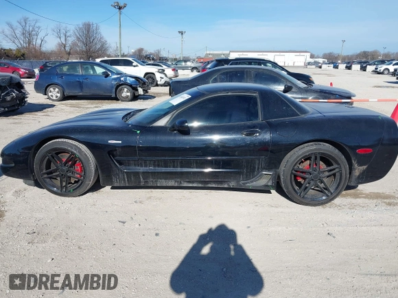 2002 Chevrolet Corvette Z06 with VIN 1G1YY12S225131395, listed as a IAAI auction lot 41440192 with 100,557 mi miles. Bid and sale history available at carsss.com. Image 14.