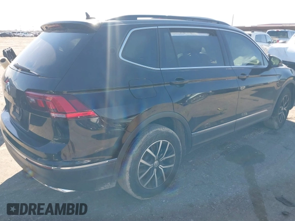 2021 Volkswagen Tiguan SE z VIN 3VV3B7AX4MM095811, wystawiony jako IAAI lot #41476490 z przebiegiem 25 668 mil mil oraz . Historia ofert i sprzedaży dostępna na DreamBid. Obrazek 4.