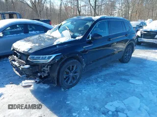 2022 Volkswagen Tiguan SE z VIN 3VV2B7AX4NM036657, wystawiony jako IAAI lot #41591503 z przebiegiem 45 416 mil mil oraz . Historia ofert i sprzedaży dostępna na DreamBid. Obrazek 17.
