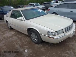 2002 Cadillac Eldorado ESC with VIN 1G6EL12Y92B100940, listed as a IAAI auction lot 42094683 with 146,859 mi miles. Bid and sale history available at carsss.com. Image 1.