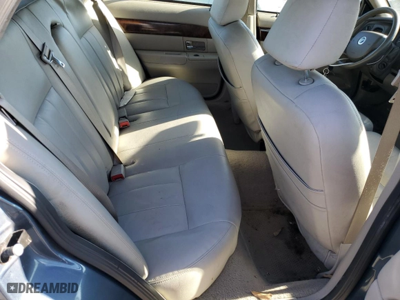 2007 Mercury Grand Marquis GS with VIN 2MEFM74V17X605829, listed as a Copart auction lot 47390265 with 154,692 mi miles and Clean Title. Bid and sale history available at carsss.com. Image 10.