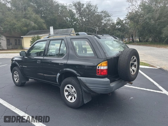 1999 Isuzu Rodeo S z VIN 4S2CK58W7X4357230, wystawiony jako Copart lot #45724855 z przebiegiem 130 446 mil mil oraz Czysty tytuł • Clean title. Historia ofert i sprzedaży dostępna na DreamBid. Obrazek 3.