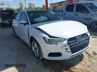 2017 Audi A3 Premium z VIN WAUAUGFFXH1042773, wystawiony jako IAAI lot #42225176 z przebiegiem 59 143 mil mil oraz . Historia ofert i sprzedaży dostępna na DreamBid. Obrazek 1.