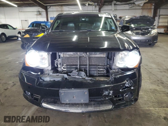 2008 Jeep Grand Cherokee SRT-8 with VIN 1J8HR78378C168740, listed as a Copart auction lot 87053654 with 139,760 mi miles and Salvage Title. Bid and sale history available at carsss.com. Image 5.