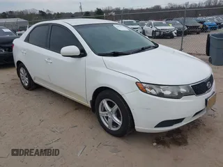 2012 Kia Forte LX with VIN KNAFT4A23C5581443, listed as a IAAI auction lot 41697825 with 115,184 mi miles. Bid and sale history available at carsss.com. Image 1.