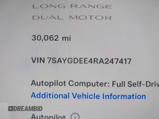 2024 Tesla Model Y Long Range with VIN 7SAYGDEE4RA247417, listed as a IAAI auction lot 41735632 with 30,062 mi miles. Bid and sale history available at carsss.com. Image 9.