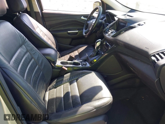 2016 Ford Escape Titanium with VIN 1FMCU0JX2GUC39416, listed as a IAAI auction lot 41793375 with 146,877 mi miles. Bid and sale history available at carsss.com. Image 5.