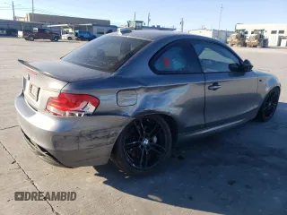2012 BMW 1 Series 135i with VIN WBAUC9C5XCVM11673, listed as a Copart auction lot 88550445 with 119,456 mi miles and Salvage title. Bid and sale history available at DreamBid. Image 3.
