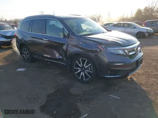 2019 Honda Pilot Touring 7-Passenger with VIN 5FNYF6H69KB050235, listed as a IAAI auction lot 41782057 with NaN miles. Bid and sale history available at carsss.com. Image 1.
