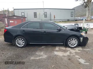 2014 Toyota Camry SE with VIN 4T1BK1FK8EU539138, listed as a IAAI auction lot 41802302 with 91,205 mi miles. Bid and sale history available at carsss.com. Image 13.