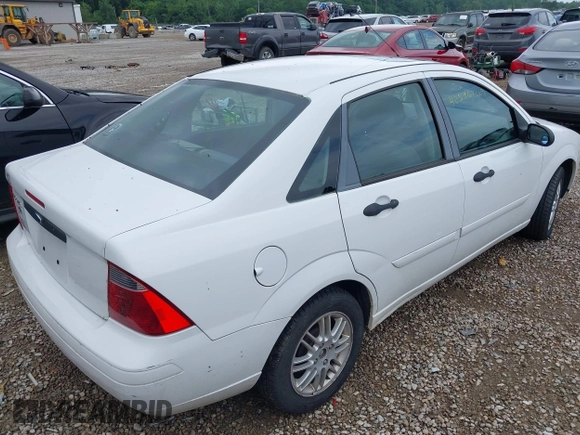 2007 Ford Focus S z VIN 1FAFP34N07W236755, wystawiony jako IAAI lot #42536269 z przebiegiem 116 074 mil mil oraz . Historia ofert i sprzedaży dostępna na DreamBid. Obrazek 6.
