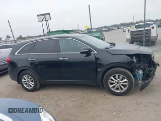 2019 Kia Sorento LX with VIN 5XYPG4A34KG579484, listed as a IAAI auction lot 40971250 with 142,327 mi miles. Bid and sale history available at carsss.com. Image 13.