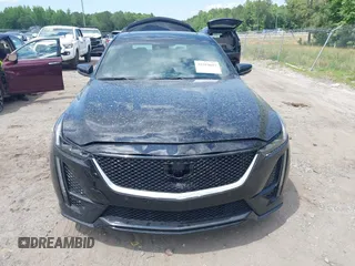 2024 Cadillac CT5 Sport z VIN 1G6DP5RK3R0127081, wystawiony jako IAAI lot #42319697 z przebiegiem 4 093 mil mil oraz . Historia ofert i sprzedaży dostępna na DreamBid. Obrazek 13.