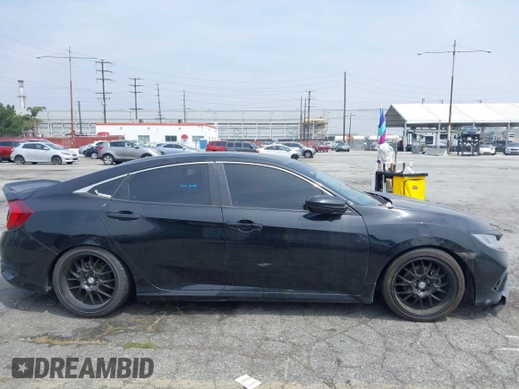 2021 Honda Civic Sport with VIN 2HGFC2F88MH557221, listed as a IAAI auction lot 42161778 with 101,956 mi miles and . Bid and sale history available at DreamBid. Image 13.