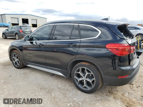 2018 BMW X1 xDrive28i with VIN WBXHT3C32J5L28030, listed as a Copart auction lot 47087415 with 100,708 mi miles and Salvage Title. Bid and sale history available at carsss.com. Image 2.