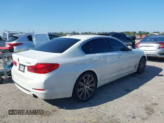 2018 BMW 5 Series 530i with VIN WBAJA5C57JWA35784, listed as a IAAI auction lot 41889468 with 68,471 mi miles and . Bid and sale history available at DreamBid. Image 4.