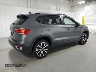 2024 Volkswagen Taos SE z VIN 3VVSX7B2XRM047527, wystawiony jako Copart lot #57903085 z przebiegiem 30 960 mil mil oraz Czysty tytuł • Clean title. Historia ofert i sprzedaży dostępna na DreamBid. Obrazek 3.