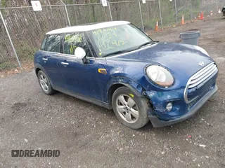 2015 MINI Hardtop 4 Door with VIN WMWXS5C56FT833335, listed as a IAAI auction lot 41961416 with 134,198 mi miles and . Bid and sale history available at DreamBid. Image 1.
