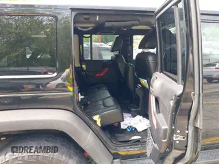 2014 Jeep Wrangler Unlimited Sahara с VIN 1C4BJWEG0EL248401, выставлен на аукционе IAAI как лот 42306970 с пробегом 134 904 миль миль и . История ставок и продаж доступна на DreamBid. Изображение 8.