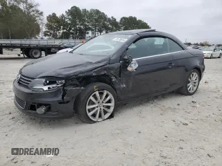 2015 Volkswagen Eos Komfort with VIN WVWBW8AH6FV005693, listed as a Copart auction lot 79176614 with 106,556 mi miles and Salvage Title. Bid and sale history available at DreamBid. Image 1.