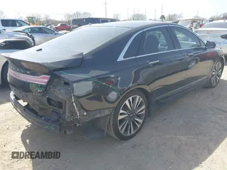 2013 Lincoln MKZ z VIN 3LN6L2GK4DR827120, wystawiony jako IAAI lot #41686914 z przebiegiem 76 114 mil mil oraz . Historia ofert i sprzedaży dostępna na DreamBid. Obrazek 4.