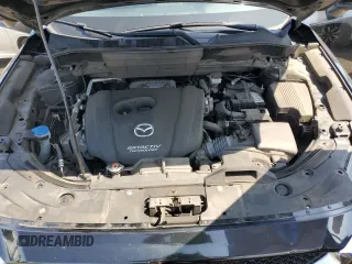 2018 Mazda CX-5 Grand Touring with VIN JM3KFBDM4J0348165, listed as a Copart auction lot 62733665 with 80,693 mi miles and Salvage title. Bid and sale history available at DreamBid. Image 11.