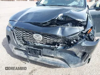 2025 Mazda CX-90 Premium Sport z VIN JM3KKCHD1S1221462, wystawiony jako IAAI lot #41765034 z przebiegiem Nie podano mil oraz . Historia ofert i sprzedaży dostępna na DreamBid. Obrazek 6.