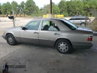 1995 Mercedes-Benz E Class with VIN WDBEA32E4SC269955, listed as a Copart auction lot 72137264 with 218,960 mi miles and Salvage Title. Bid and sale history available at carsss.com. Image 2.