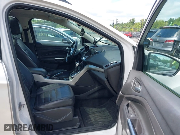 2013 Ford Escape SEL with VIN 1FMCU9HX1DUA51248, listed as a IAAI auction lot 42185187 with 123,845 mi miles and . Bid and sale history available at DreamBid. Image 5.