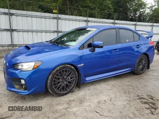 2015 Subaru WRX STI with VIN JF1VA2L69F9837435, listed as a Copart auction lot 73206354 with 57,811 mi miles and Salvage title. Bid and sale history available at DreamBid. Image 1.