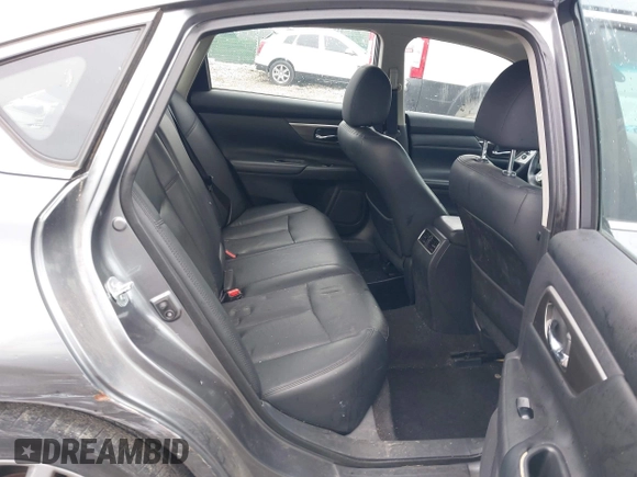 2015 Nissan Altima SL z VIN 1N4BL3AP8FC581581, wystawiony jako IAAI lot #42331651 z przebiegiem 65 846 mil mil oraz . Historia ofert i sprzedaży dostępna na DreamBid. Obrazek 8.