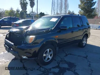 2007 Honda Pilot EX-L with VIN 5FNYF185X7B016807, listed as a IAAI auction lot 41759785 with 129,690 mi miles. Bid and sale history available at carsss.com. Image 2.
