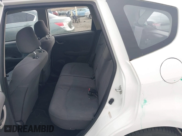2013 Honda Fit with VIN JHMGE8H39DC005052, listed as a IAAI auction lot 41008236 with 124,874 mi miles. Bid and sale history available at carsss.com. Image 8.