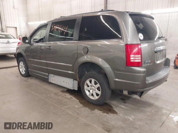 2010 Chrysler Town & Country Touring Plus with VIN 2A4RR8D17AR393916, listed as a IAAI auction lot 42171114 with 123,741 mi miles. Bid and sale history available at carsss.com. Image 3.
