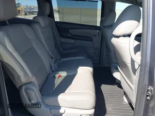 2014 Honda Odyssey EX-L with VIN 5FNRL5H67EB096027, listed as a IAAI auction lot 41950398 with 147,158 mi miles and . Bid and sale history available at DreamBid. Image 8.