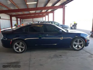 2015 Dodge Charger SE with VIN 2C3CDXBG2FH835787, listed as a IAAI auction lot 42069235 with 119,805 mi miles. Bid and sale history available at carsss.com. Image 13.