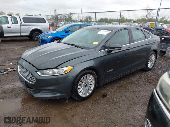 2015 Ford Fusion SE Hybrid with VIN 3FA6P0LU9FR184907, listed as a IAAI auction lot 42119737 with 153,255 mi miles and . Bid and sale history available at DreamBid. Image 18.