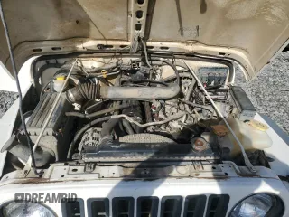 2006 Jeep Wrangler Sport Right Hand Drive with VIN 1J4F449S26P741397, listed as a Copart auction lot 41656585 with 205,683 mi miles and Clean Title. Bid and sale history available at carsss.com. Image 12.