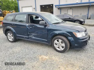 2013 Dodge Journey American Value with VIN 3C4PDCAB6DT577273, listed as a Copart auction lot 50627295 with 139,775 mi miles and Salvage title. Bid and sale history available at DreamBid. Image 4.
