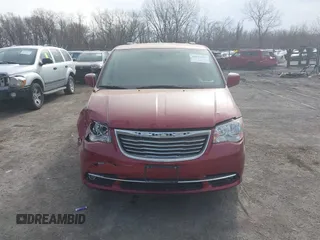 2014 Chrysler Town & Country Touring with VIN 2C4RC1BG9ER418147, listed as a IAAI auction lot 41812594 with 161,356 mi miles and . Bid and sale history available at DreamBid. Image 12.