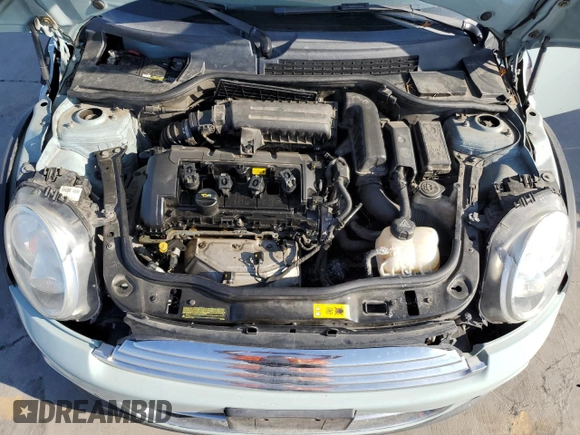 2013 MINI Convertible z VIN WMWZN3C57DT569379, wystawiony jako Copart lot #71982954 z przebiegiem 152 142 mil mil oraz Czysty tytuł • Clean title. Historia ofert i sprzedaży dostępna na DreamBid. Obrazek 11.