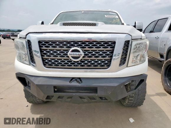 2016 Nissan Titan Platinum Reserve с VIN 1N6BA1F21GN513109, выставлен на аукционе Copart как лот 56116825 с пробегом 94 263 миль миль и Чистый • Clean title. История ставок и продаж доступна на DreamBid. Изображение 5.