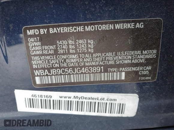 2018 BMW 5 Series M550i xDrive with VIN WBAJB9C56JG463891, listed as a IAAI auction lot 41731556 with 104,860 mi miles. Bid and sale history available at carsss.com. Image 9.