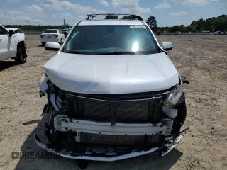 2020 Chevrolet Traverse Premier with VIN 1GNERKKW4LJ274817, listed as a Copart auction lot 54577265 with 83,921 mi miles and Salvage title. Bid and sale history available at DreamBid. Image 5.